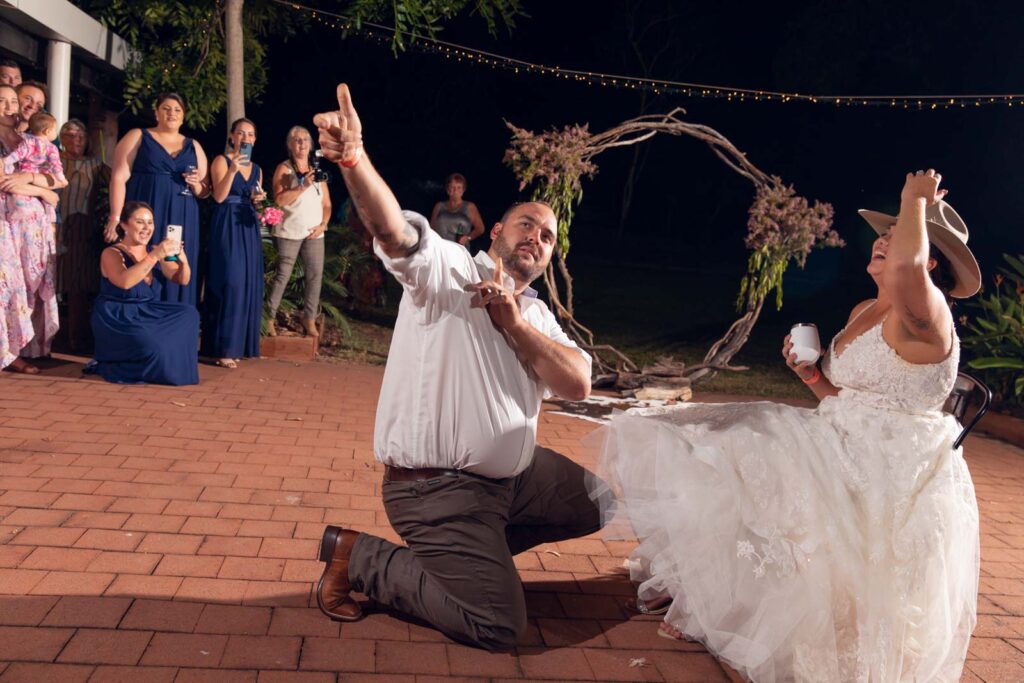 Groom removes brides garter at the Bark Hut Inn wedding