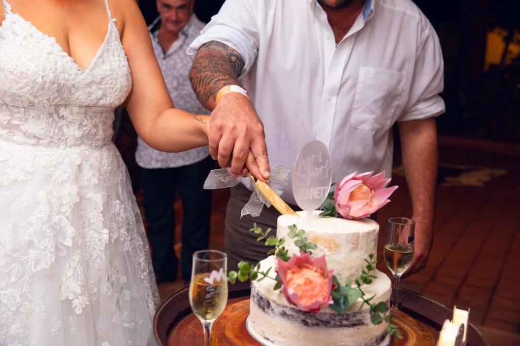 Curring the wedding cake. Bark hut Inn NT.