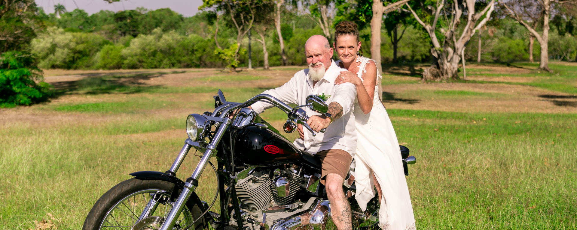 Nedwly weds sat on a Harley Davidson at Bundilla beach car park Darwin